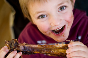 Child Eating Ribs
