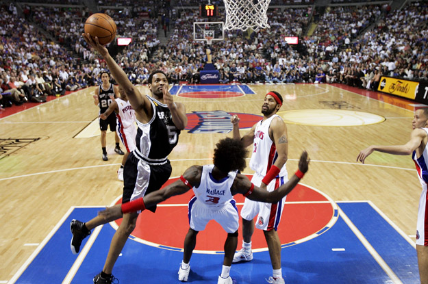 AUBURN HILLS, MI - JUNE 19:  Robert Horry #5 of the San Antonio Spurs tries to get to the basket through Ben Wallace #3 and Rasheed Wallace #36 of the Detroit Pistons in the first half of Game five of the 2005 NBA Finals at The Palace of Auburn Hills on June 19, 2005 in Auburn Hills, Michigan.