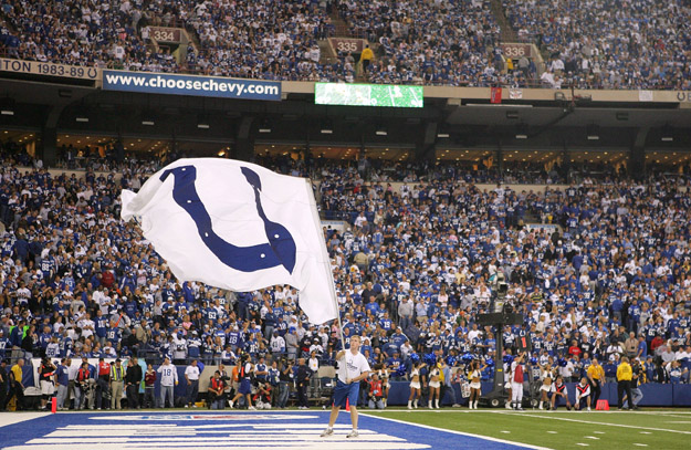 INDIANAPOLIS - NOVEMBER 04:  A flag with the logo of the Indianapolis Colts is waved in front of fans in the endzone against the New England Patriots on November 4, 2007 at the RCA Dome in Indianapolis, Indiana. The Patriots won 24-20. (Photo by Andy Lyons/Getty Images)