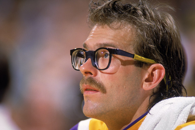 LOS ANGELES - 1987:  Kurt Rambis #31 of the Los Angeles Lakers sits on the bench during an NBA game at the Great Western Forum in Los Angeles, California in 1987. 