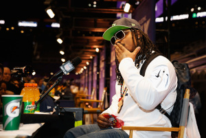 PHOENIX, AZ - JANUARY 27:  Marshawn Lynch #24 of the Seattle Seahawks addresses the media at Super Bowl XLIX Media Day Fueled by Gatorade inside U.S. Airways Center on January 27, 2015 in Phoenix, Arizona.  (Photo by Christian Petersen/Getty Images)