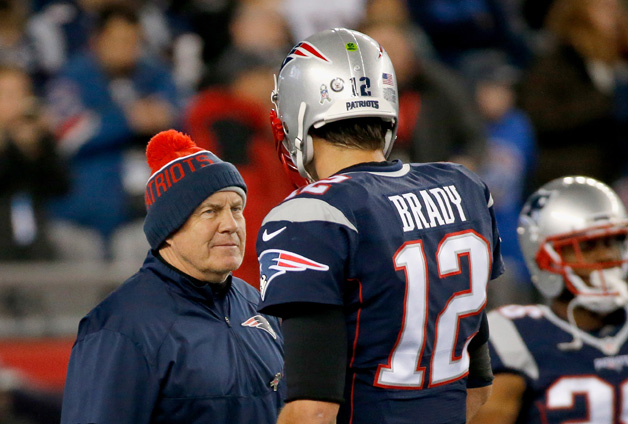 Head coach Bill Belichick talks with Tom Brady #12 of the New England Patriots before a game against the Seattle Seahawks at Gillette Stadium on November 13, 2016 in Foxboro, Massachusetts.