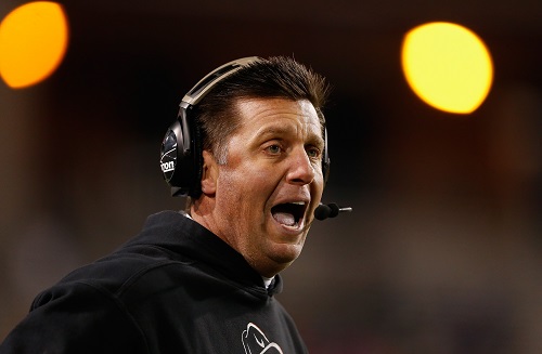 TEMPE, AZ - JANUARY 02: Head coach Mike Gundy of the Oklahoma State Cowboys watches from the sidelines during the fourth quarter of the TicketCity Cactus Bowl against the Washington Huskies at Sun Devil Stadium on January 2, 2015 in Tempe, Arizona. The Cowboys defeated the Huskies 30-22. (Credit: Christian Petersen/Getty Images)