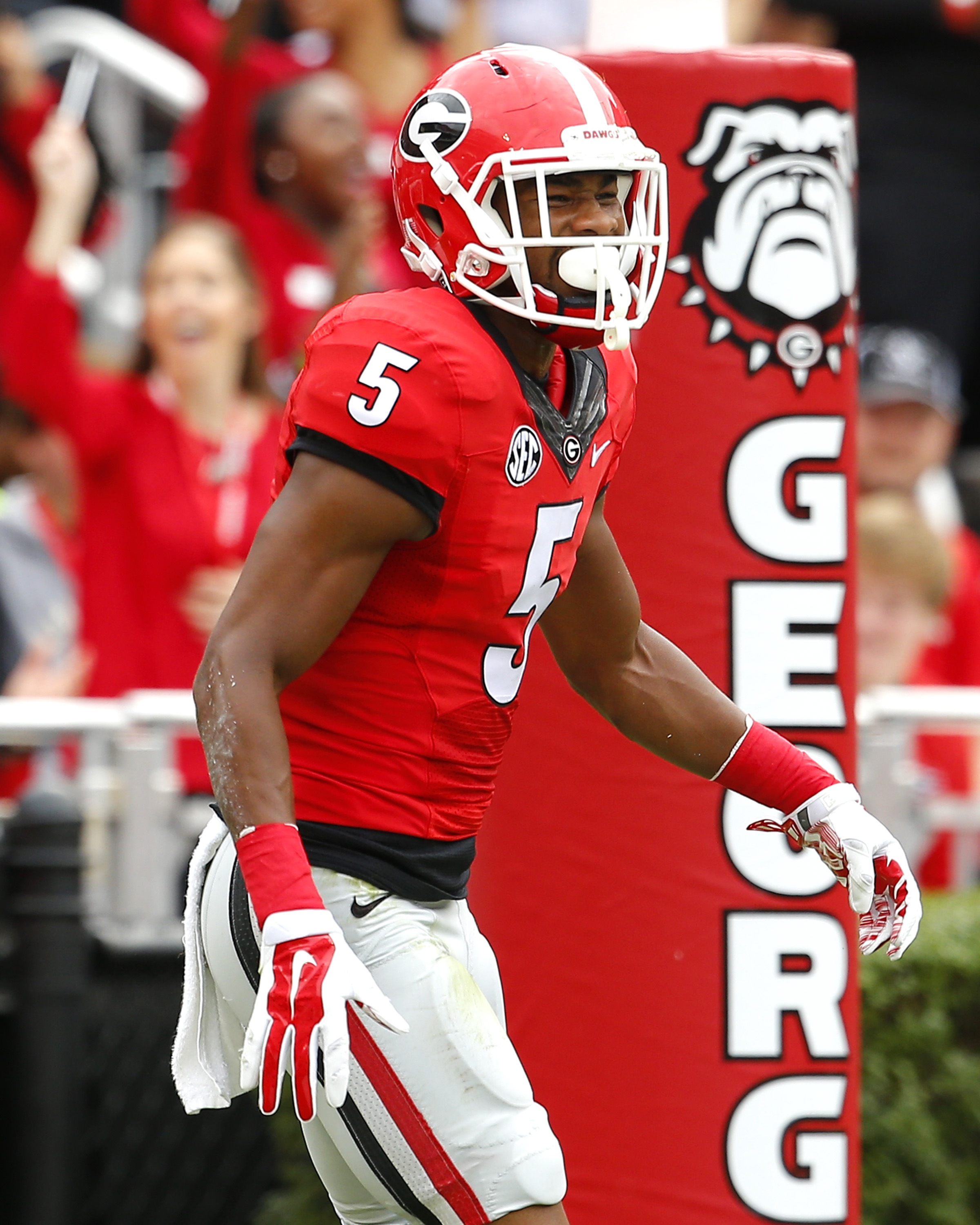 ATHENS, GA - NOVEMBER 7: Terry Godwin #5 of the Georgia Bulldogs reacts after scoring a touchdown in the first quarter of the game against the Kentucky Wildcats on November 7, 2015 at Sanford Stadium in Athens, Georgia. Georgia won the game 27-3. (Credit: Todd Kirkland/Getty Images) *** Local Caption *** Terry Godwin