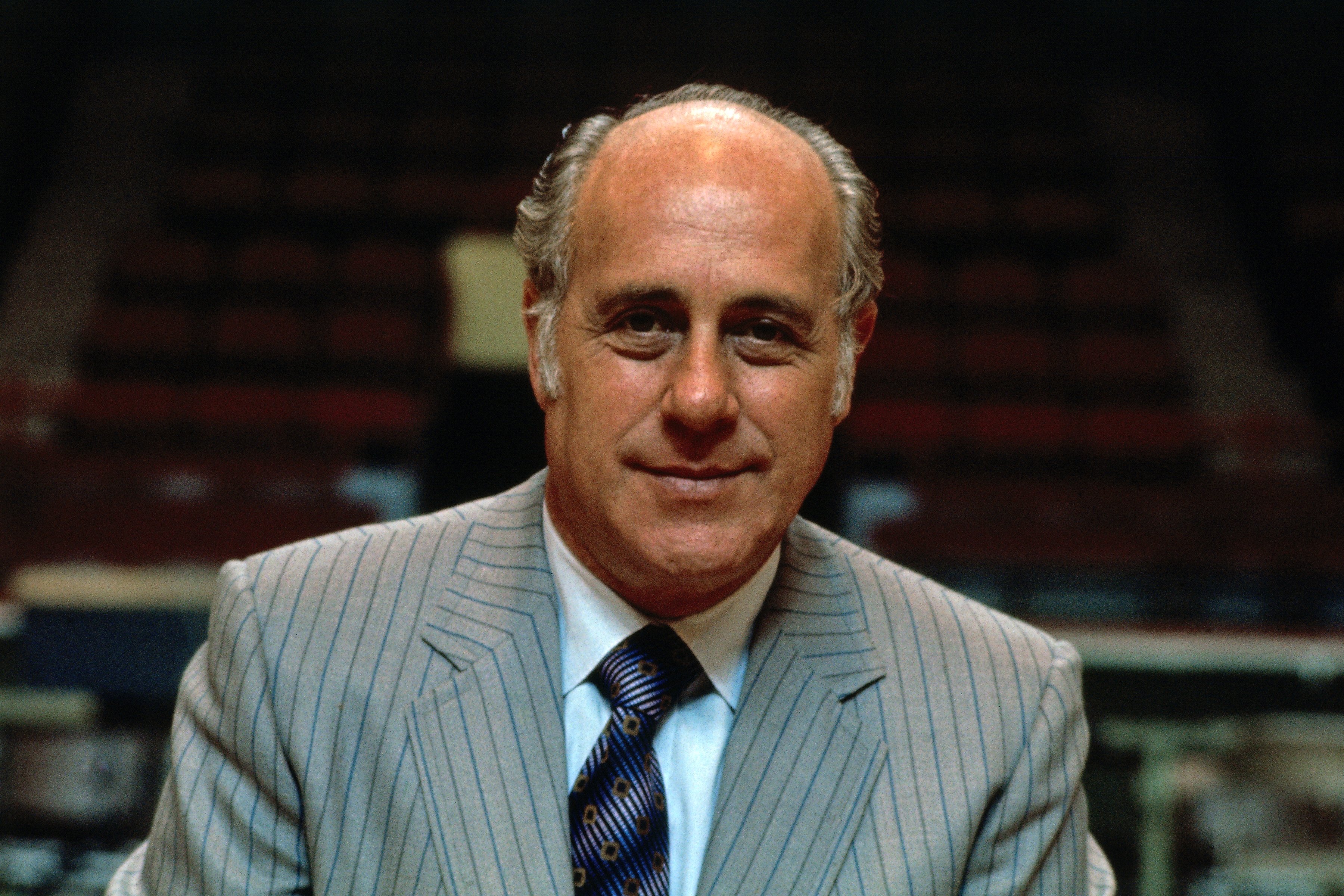 BOSTON - 1978: Red Auerbach of the Boston Celtics poses for a portrait during a game played in 1978 at the Boston Garden in Boston, Massachusetts. NOTE TO USER: User expressly acknowledges and agrees that, by downloading and or using this photograph, User is consenting to the terms and conditions of the Getty Images License Agreement. Mandatory Copyright Notice: Copyright 1978 NBAE (Photo by Dick Raphael/NBAE via Getty Images)