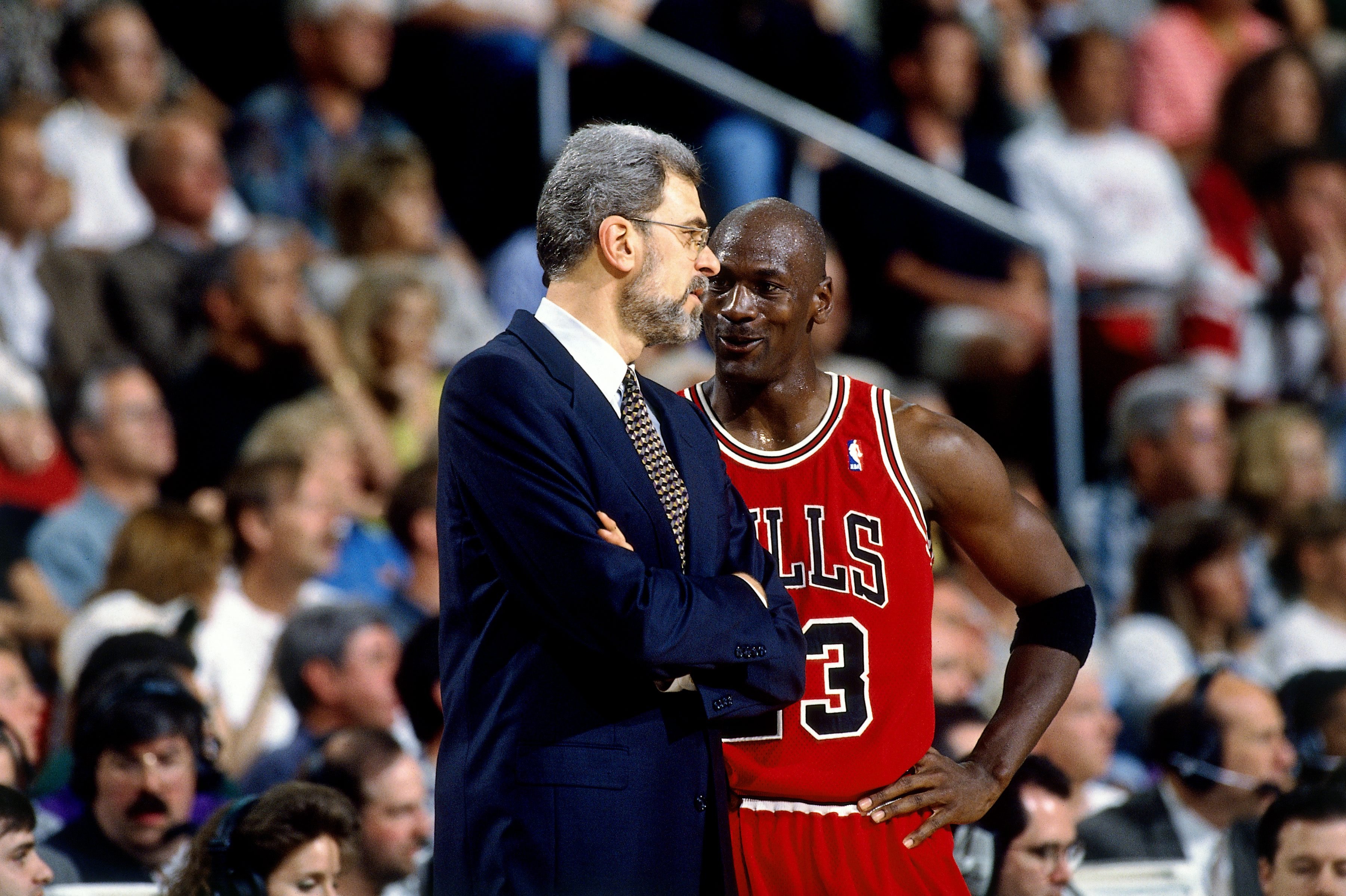 The master of Zen chats with the master of everything else NBA. (Photo by Andrew D. Bernstein/NBAE via Getty Images)