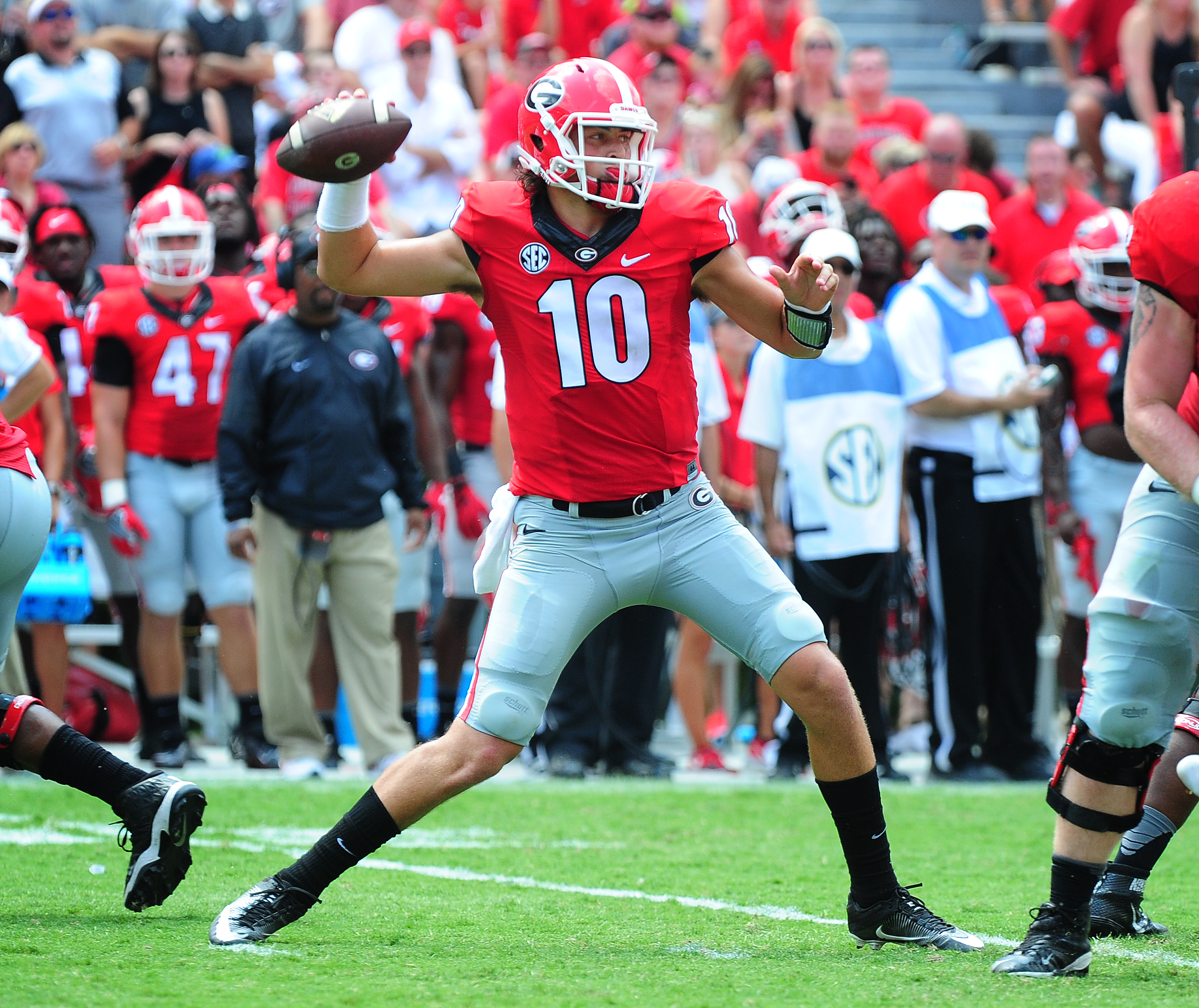 Freshman quarterback Jacob Eason and the Dawgs are 4-2 at the halfway point of the season. (Photo by Scott Cunningham/Getty Images)