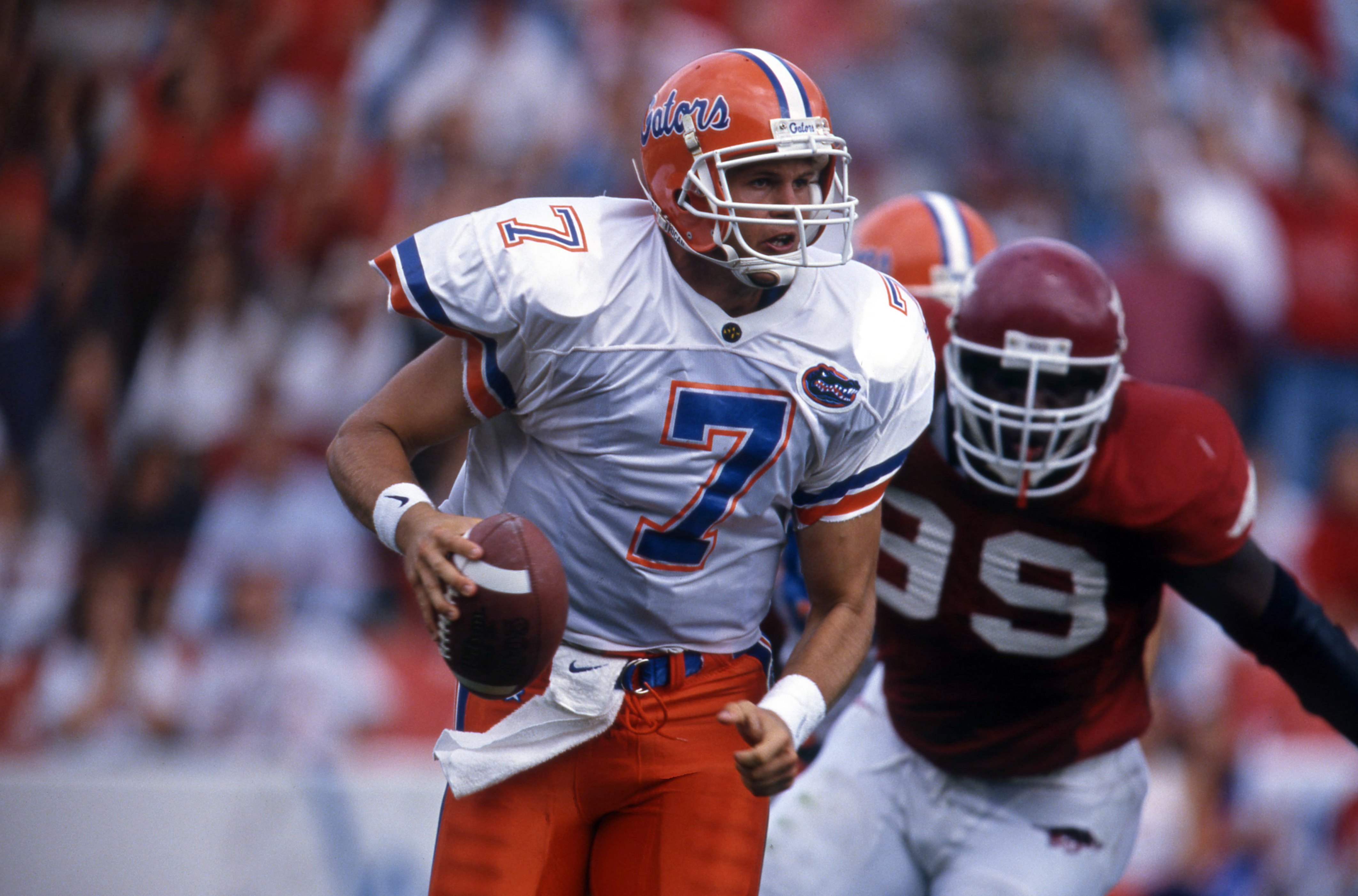 Quarterback Danny Wuerffel #7 of the Florida Gators runs with the ball Arkansas in 1996. (Photo by Andy Lyons/Getty Images)